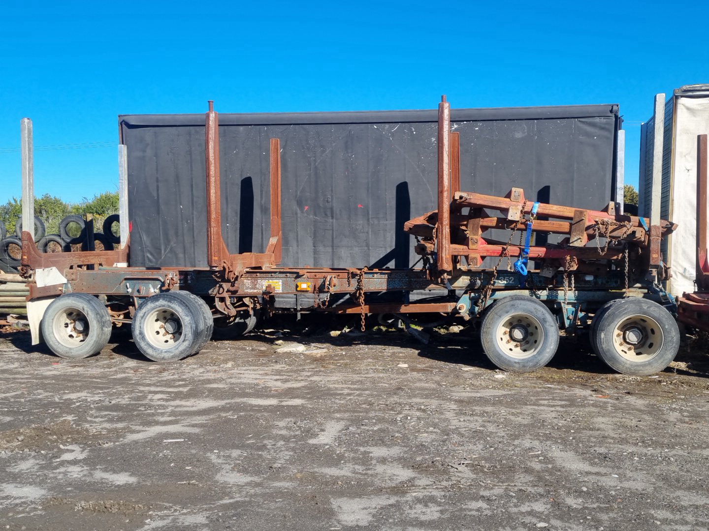 2000 fh12- 4 axle evans logging trailer PN: